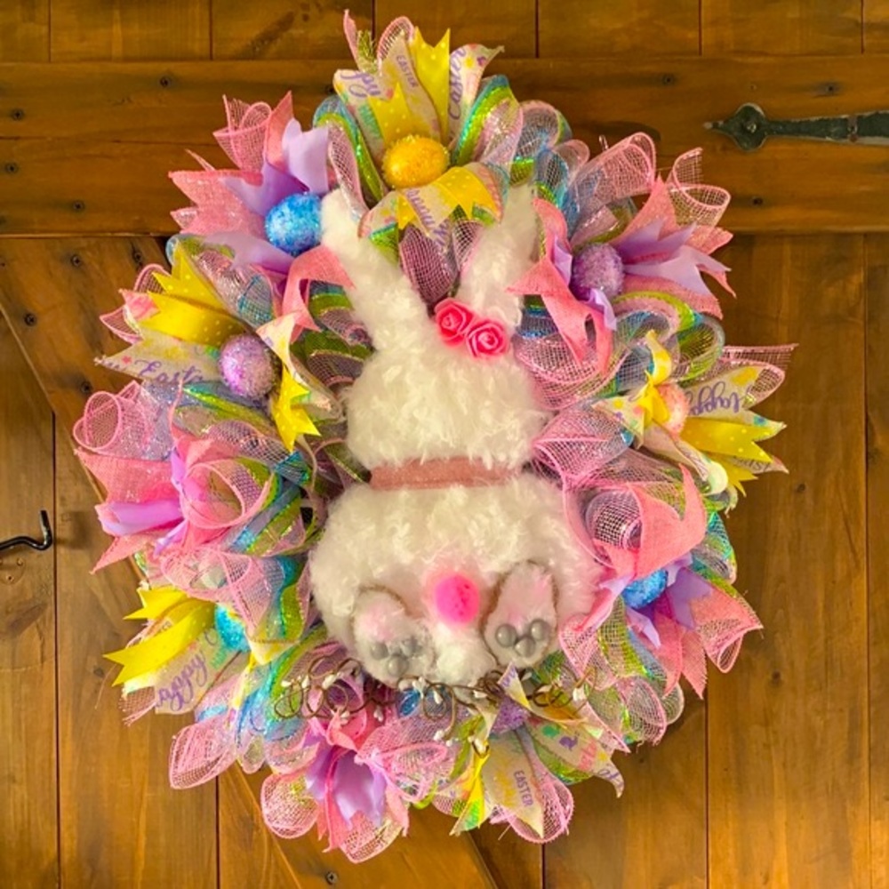 Easter egg frame with deco mesh, ribbon and and wood rabbit. Looks like Spring!